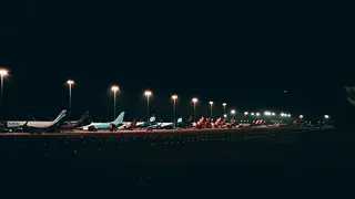 Row of airliners on the apron at night, Bengaluru Airport