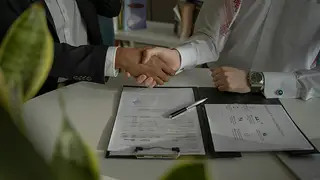 Handshake over a document