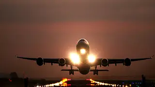 Airliner taking off at night