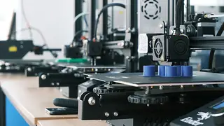 Row of 3D printers at work