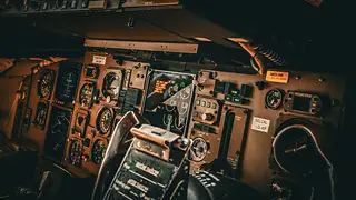 Airliner flight deck with instruments and controls